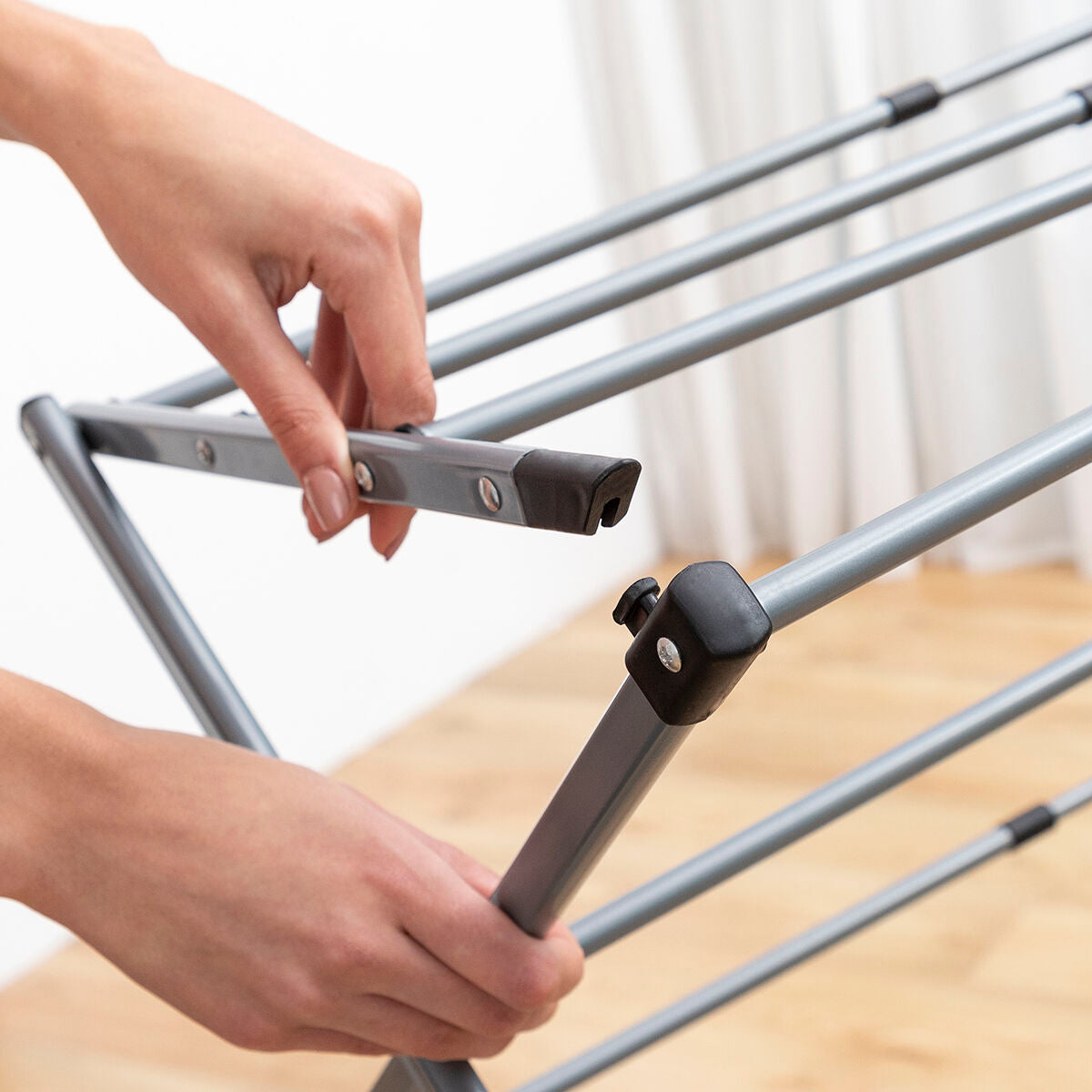 Séchoir à Linge Métallique Pliable et Extensible 3 Hauteurs Cloxy 11 Barres